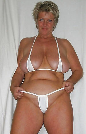 women respecting bikinis posing nude