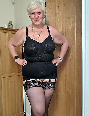 titillating horny granny in lingerie deport oneself off